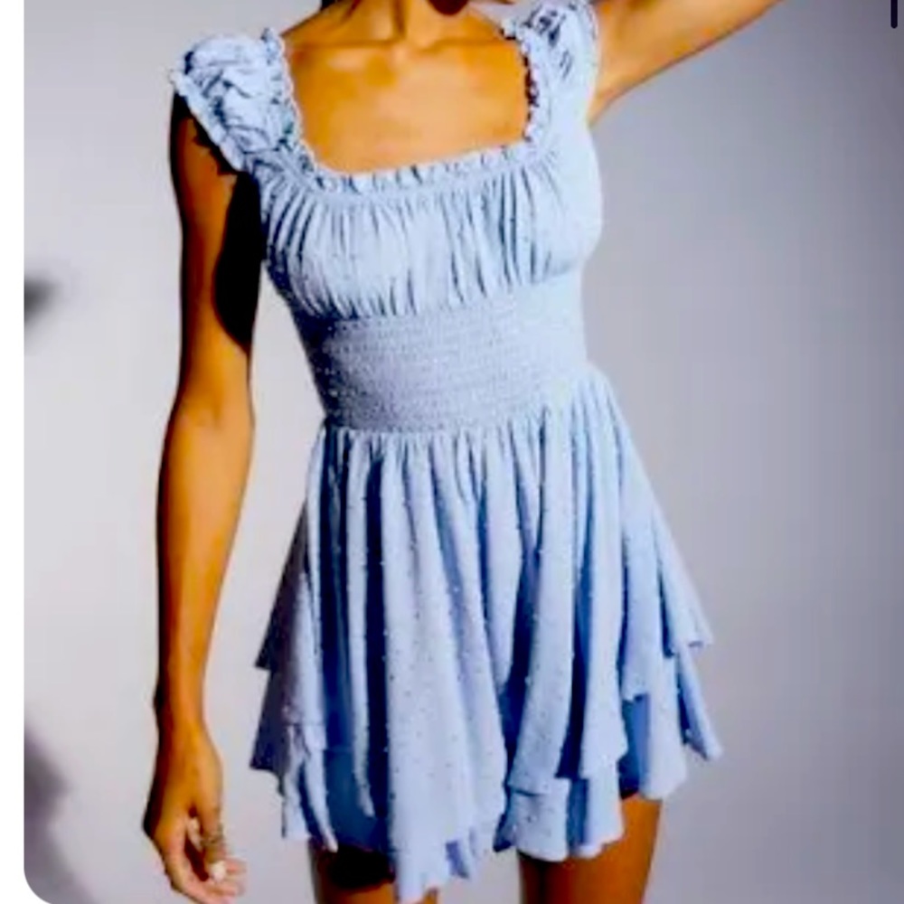 Urban outfitters tiered ruffle romper baby blue. Size s shrunk to xs! Never worn